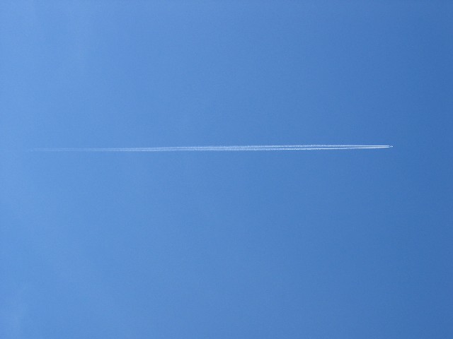 Contrails on sunny days